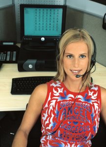 woman wearing headset at computer